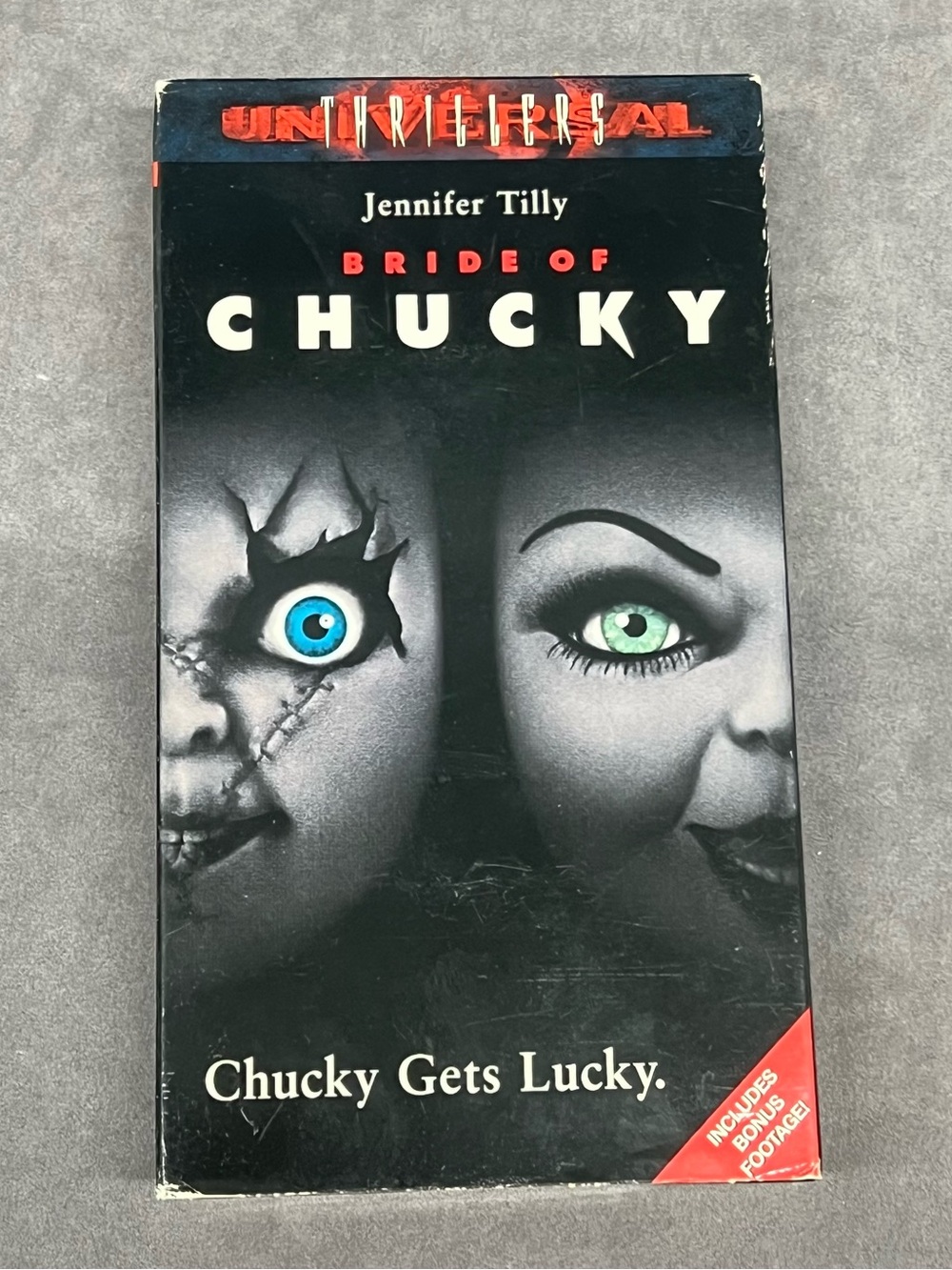 Universal Bride of Chucky VHS Cover — Black with Blue & Green Eyes